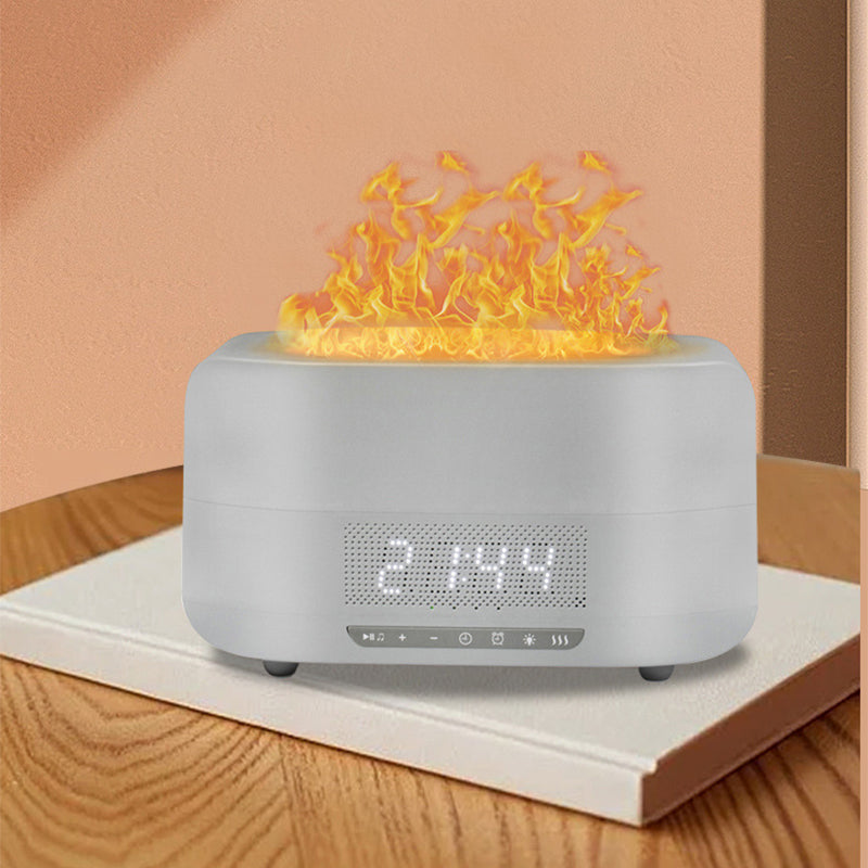 Diffuseur d'arômes à effet flamme, humidificateur intégré et enceinte Bluetooth — ambiance chaleureuse à domicile